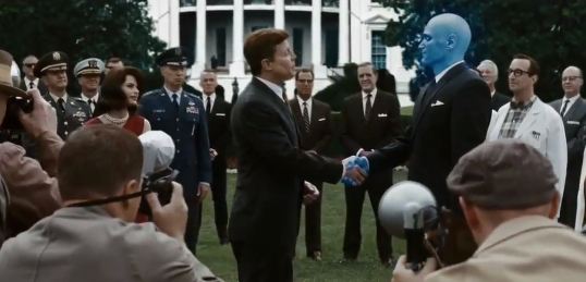 watchmen movie JFK shakes hands with Dr. Manhattan